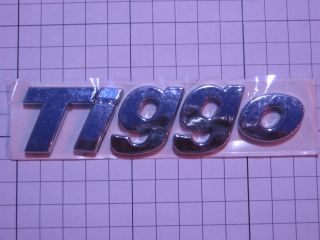 Эмблема надпись "Tiggo"